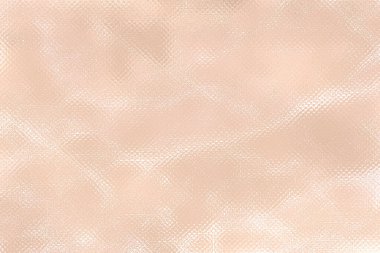 Arkaplan için buruşmuş krema kağıdının dokusu.