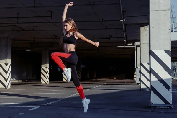 Sportswoman Jumping Stretching Full Length Healthy Female Exercising Jumping Outdoors — Stock Photo, Image