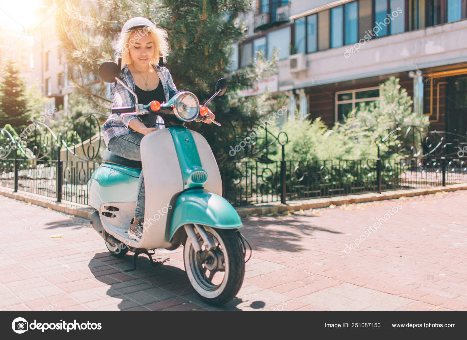 girls driving scooty