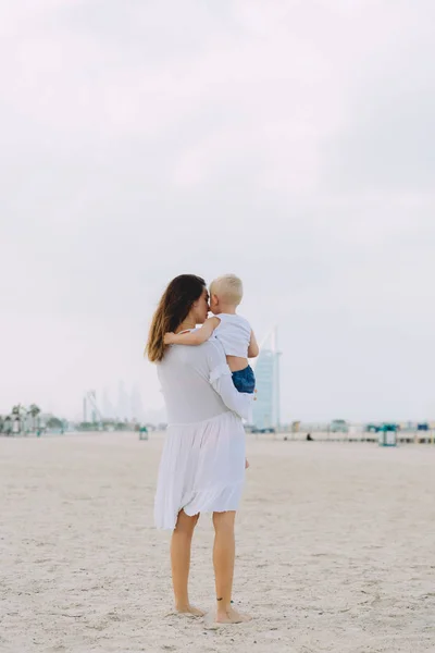 Young Mother Happy Little Son Sandy Beach Dubai Uae — Stock Photo, Image