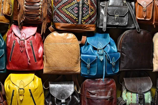 Colorful, leather backpacks on the exhibition in Fez, Morocco.