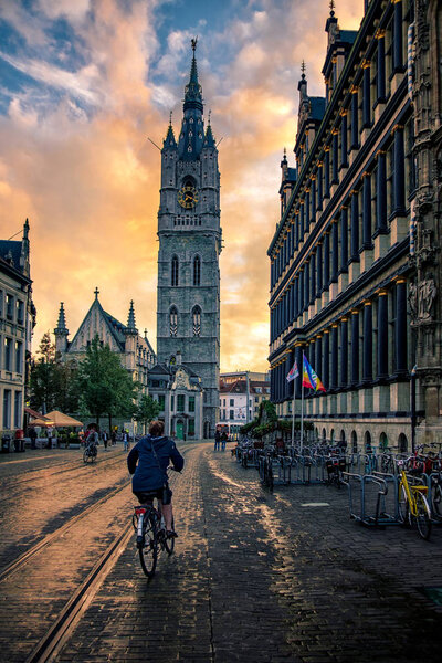 Cyclist in Ghent at sunset