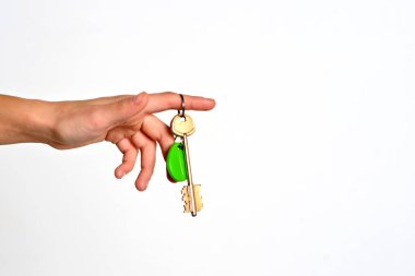 Kadın palm evde biblo ile evin anahtarı. Kiralık Emlak. Satılık özelliği şablon.