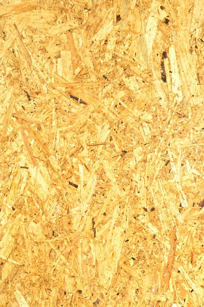 OSB boards made of wood chips, brown wood floors. Top view of OSB wood veneer surface smooth and smooth, white background.