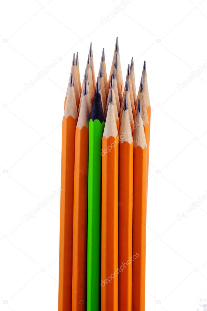 A lot colorful pencils with accent on red one on white background