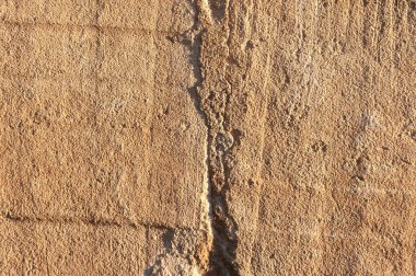 Gün batımında kızaran ışık ile Mes taş dokusu. Sandstone desenli arkaplan