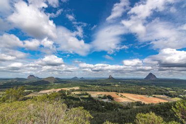 Lighning stirkes over the Glasshouse Mountains. Queensland, Australia clipart