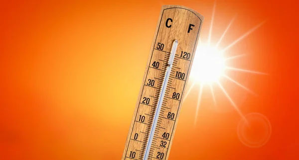 Thermometer Orange Background Hot Summer Sun Heat Wave Concept Degrees — Stockfoto