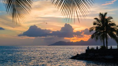 Scenic landscape of Tahiti at sunset.  clipart