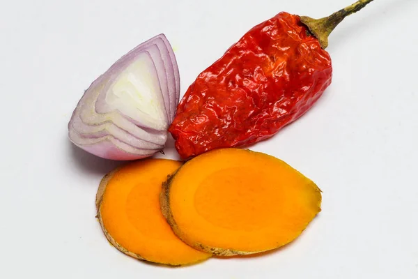 Cooking Spices Consisting Turmeric Shallots Cayenne Pepper Which Isolated White — Stock Photo, Image