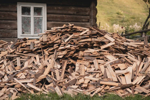 Dry chopped firewood in rural place mountain — Stock Photo, Image