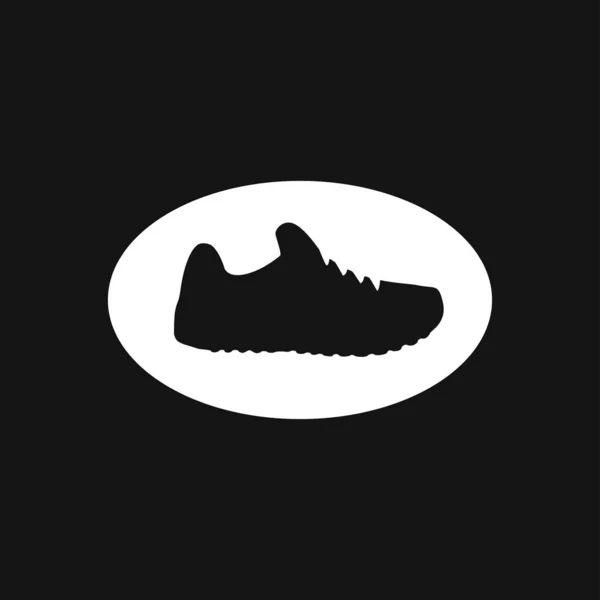 スニーカーアイコン 背景に隔離された靴のシンボル — ストックベクタ