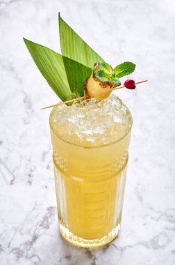 mai tai - classic alcohol long drink hawaiian cocktail. mai tai is made from white and dark rum, orange curacao liqueur, Orgeat almond syrup and lime juice.