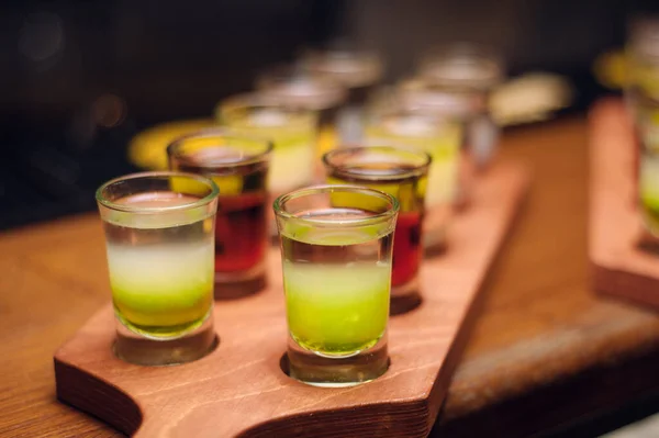 Line Alcohol Green Shots Wooden Desk Bar Counter Row Little — Stockfoto