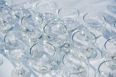 pattern of many empty wine glass circles. catering. welcome drink service
