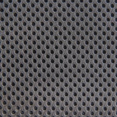 grey breathable porous poriferous material for air ventilation with black holes