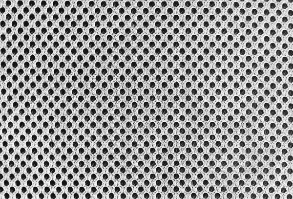 Gri solunabilir gözenekli, delikli hava havalandırması malzemesi. Siyah ve beyaz spor malzemeleri naylon kumaş..