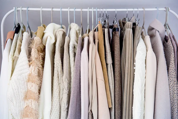 Fashion winter coats hanged on a clothes rack — Stock Photo, Image