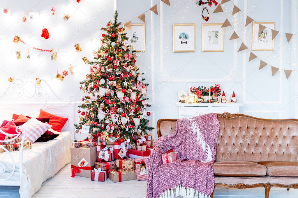 Christmas living room with a christmas tree and presents under it