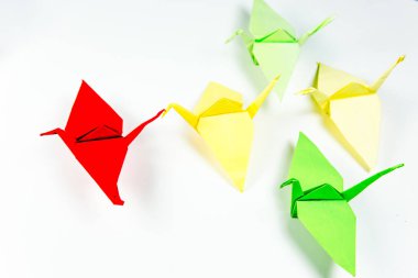 liderlik kavramı ile origami tekneler ve kuğular