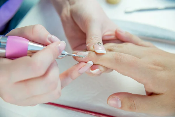 nail care and manicure in a nail salon