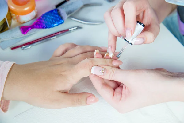 nail care and manicure in a nail salon