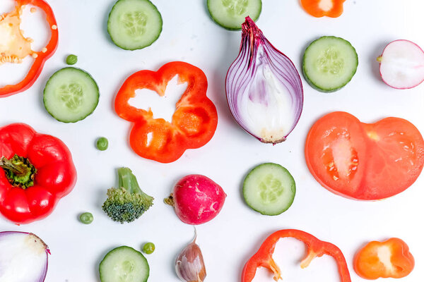 a fresh group of vegetables on white background