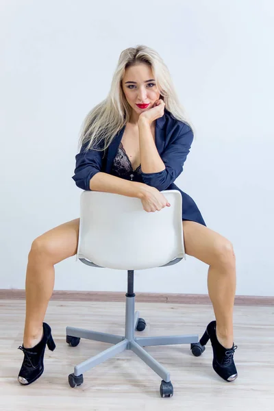 A businesswoman or a secretary in a jacket and lingerie — Stock Photo, Image