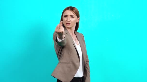 Rude and rude young woman in business suit showing her middle finger looking at the room — Stock Video