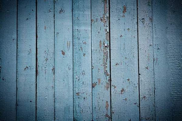 Natural wood background with cracked blue paint — Stock Photo, Image