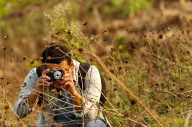 Doğanın adamı, fotoğrafçı.