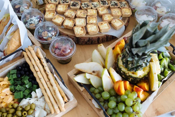 Variety assortment of different luxury food snacks and appetizers, concept of decorated catering banquet set, on a party event celebration