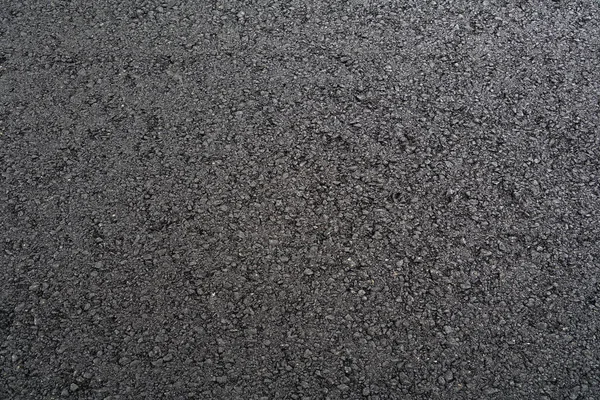 新しい舗装道路表面アスファルト背景 — ストック写真