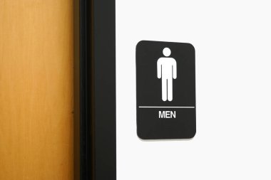     Tuvalet tabelası duvarda.                           