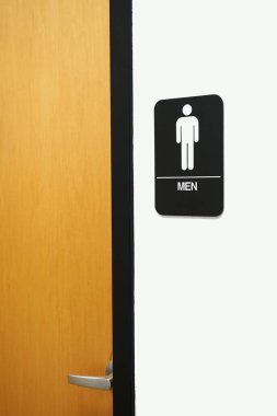 Tuvalet tabelası duvarda.                               