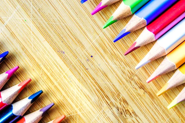 Multicolored Rainbow Colors Pencils Dirty Wooden Textured Background Forming Pattern — Stock Photo, Image