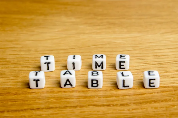 Kleine Dobbelstenen Vorming Van Specifieke Word Tijd Tabel Als Een — Stockfoto