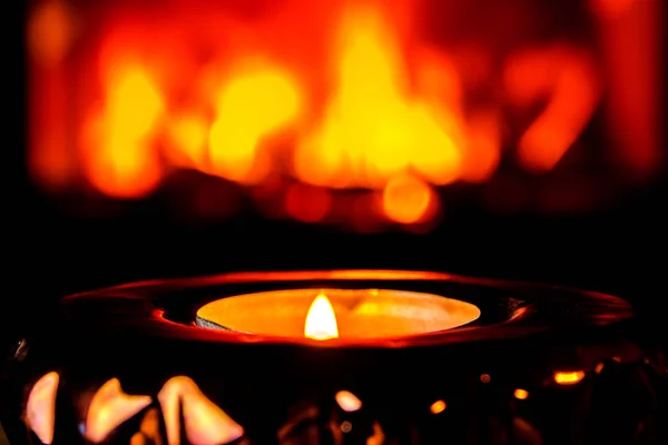 Closeup Lit Candle Blurred Fireplace Fired Background Night Home Atmosphere — Stock Photo, Image