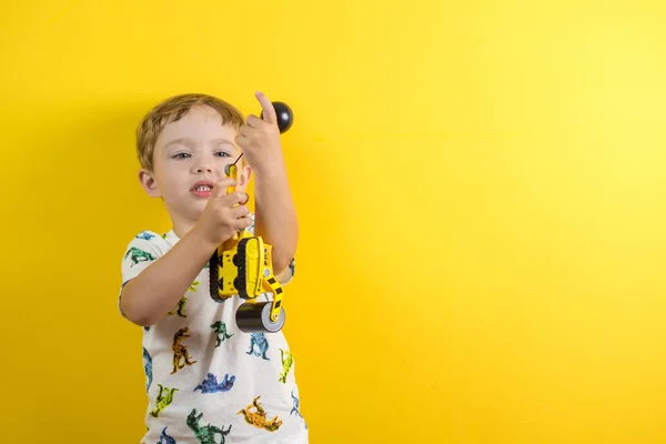 Adorable small three years old boy with cute face expression pla — Stock Photo, Image