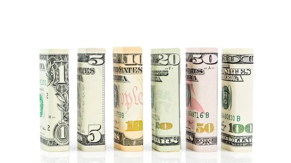 Close-up de dólares americanos na forma de blocos em todas as denominações — Fotografia de Stock