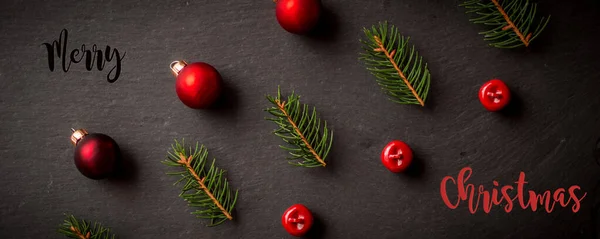 Christmas decorations closeup on black background from above — Stock Photo, Image