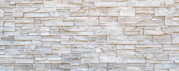 大きさの異なる長方形の岩でできた石垣 — ストック写真
