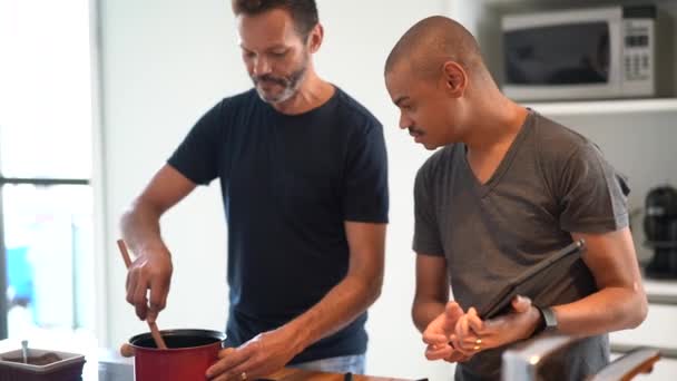 Gay Couple Making Chocolate Brigadeiro Kitchen — Stock Video