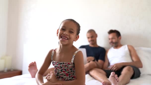 Portrait Adopted Daughter Gay Parents Bed Background — Stock Video