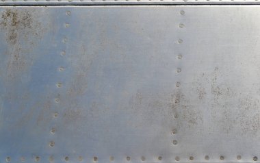 Perçinli eski paslı metal alüminyum arka plan