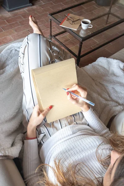 Young Woman Starting Write Blank Notebook Sitting Sofa Home Pen — Stock Photo, Image