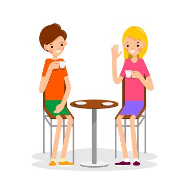 İki kız oturup kahve içiyor. İki kadın oturmuş sıcak bir şeyler içiyor. Düz bir tasvir. Arkadaşlar toplantı sırasında kahve bardaklarını tutacaklarını söylüyorlar. İzole edilmiş