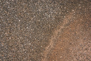 Bazı bitkiler ile su vücut yakınındaki Soyut doku kum desen 