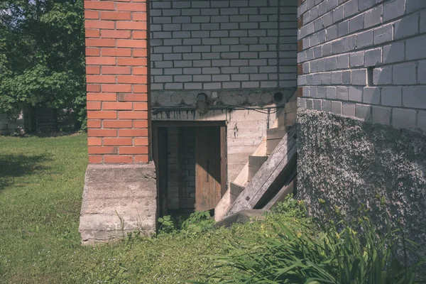 wall of bricks building in sunny day