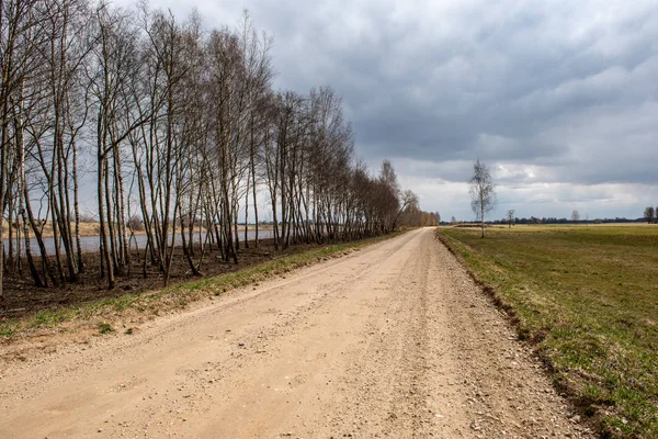 Route Gravier Campagne Vide Avec Des Flaques Boue Des Bosses — Photo